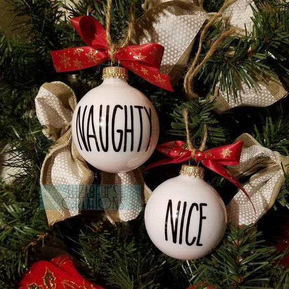 Christmas ornaments that say Naughty and Nice.