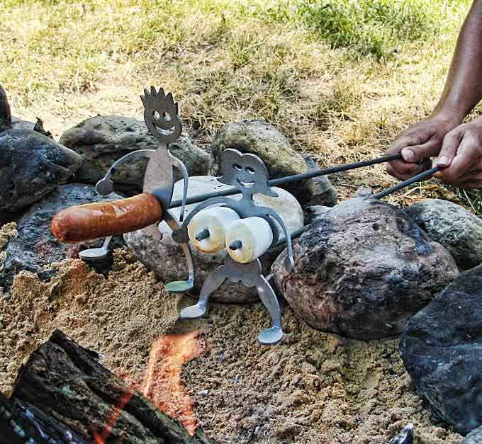 man's stick holds a hot dog, women's two little prongs hold's 2 marshmellows that make them look like breasts