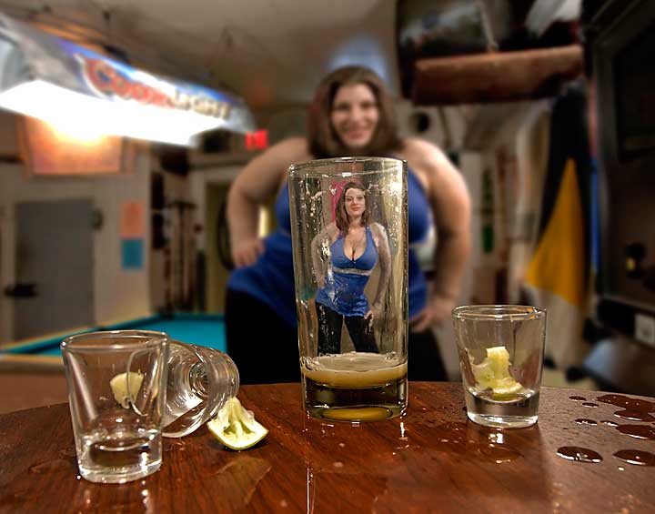 Looking through empty glass shows beautiful woman slimmed down from huge woman