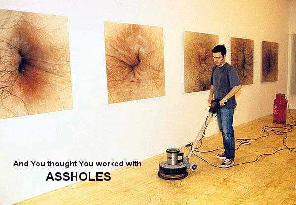 man working in a photo gallery of assholes